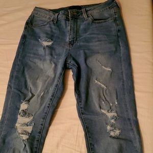 Just USA light wash destroyed jeans. Size 7